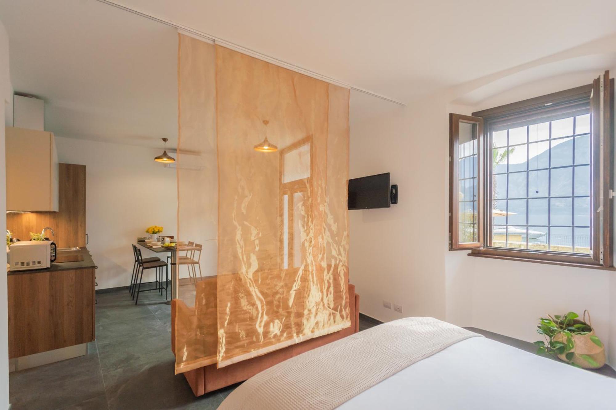 Cozy Nest On The Lake By Rent All Como เตรเมสโซ ภายนอก รูปภาพ